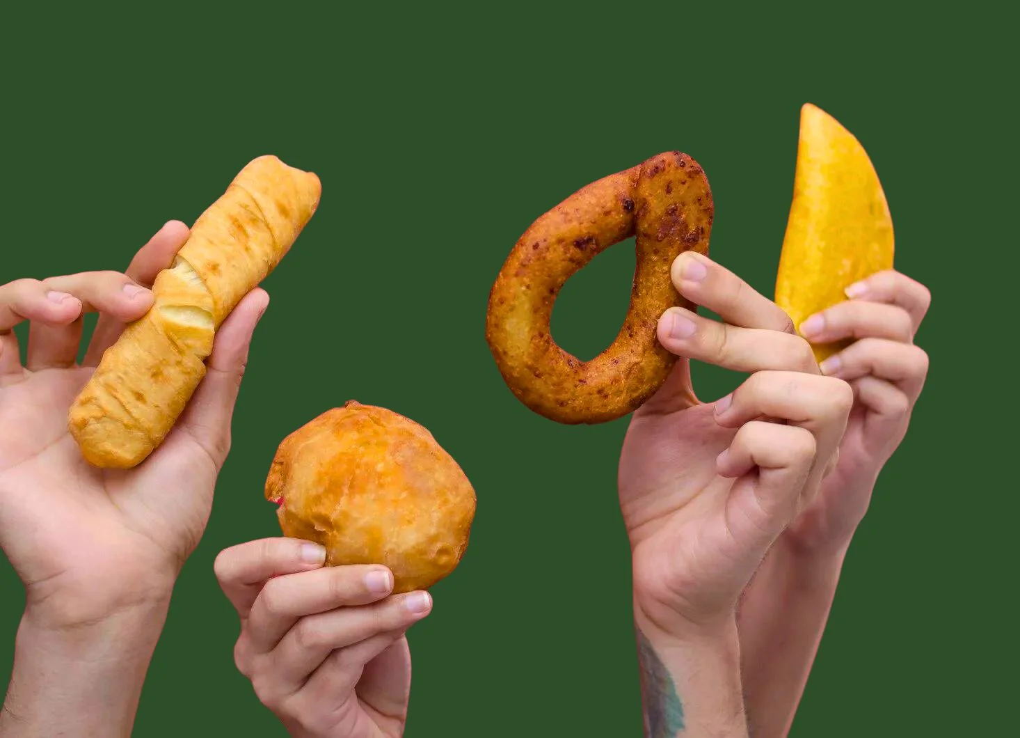 person holding brown bread with yellow sliced ​​fruit